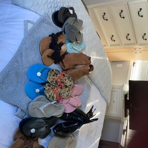 13 pairs of sandals and boots. Some with tags. Perfect condition.